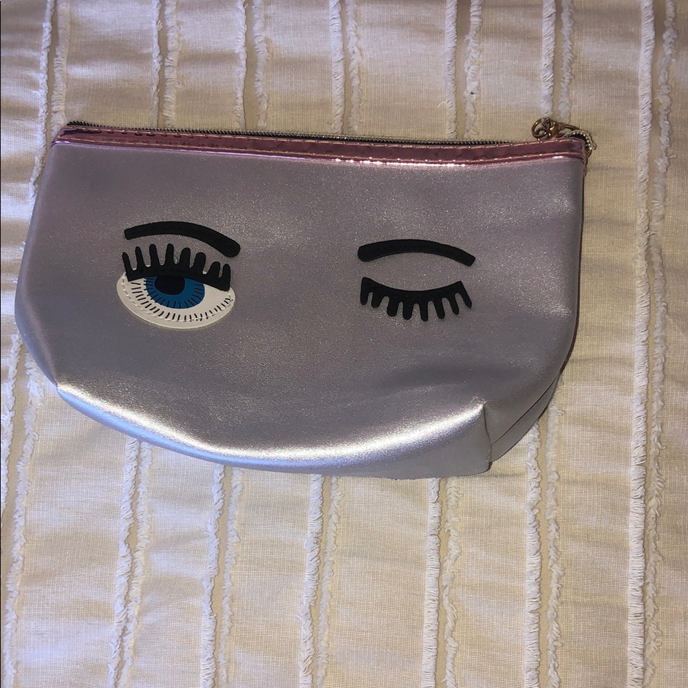 2 chic silver with  Eye wink Clutch